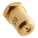 A gold metal cylinder with the number 63 carved in it.