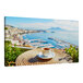 Elephant Stock canvas wall art of a cup of coffee on a table with a view of the water and boats.