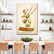 A large canvas wall art with salmon sushi rolls and chopsticks on it.