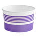 A purple and white paper cup with the words "Frozen Yogurt" on it.