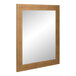 A BrandtWorks rectangular mirror with a brushed gold frame.