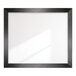 A BrandtWorks mirror with a scratched black frame.