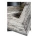 A close up of a wood frame with a white and gray distressed finish.