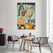 A white canvas painting of wine bottles and glasses on a wall.
