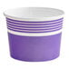 A purple paper frozen yogurt cup with white stripes.