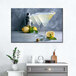 A canvas wall art of a lemon drop martini with a lemon slice on the side of the glass.