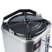 A close up of a stainless steel Grindmaster coffee shuttle with a lid.