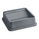 A Lavex 25 gallon grey square trash can swing lid on a grey rectangular object with a lid.