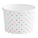 A white paper cup with colorful dots.
