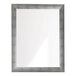 A rectangular mirror with a swirled silver frame.