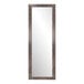A long rectangular BrandtWorks mirror with a wooden frame with a distressed brown finish.