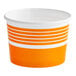 A close-up of a orange and white paper cup.