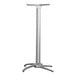 A metallic silver powder-coated aluminum table base with a white pole and silver stand.