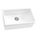 A white Ruvati Fiamma sink with a silver drain.
