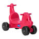 A red CarePlay puppy ride-on toy with wheels.