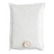 A white plastic bag of Brill Ready-to-Whip Vanilla Topping with a white cap.