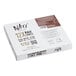 A white box with brown and black text that reads "Nats Rawline Plant-Based Vegan Caramel and Chocolate Raw Cake Square"