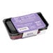 A plastic container of Nats Rawline plant-based vegan raspberry and blueberry cake squares with a purple label.