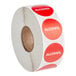 A roll of Point Plus red alcohol labels with 1" round red circles.
