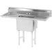 A stainless steel Advance Tabco one compartment sink with two drainboards on a counter.
