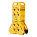 An Alpine yellow plastic mobile barricade fence with black handles.