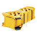 An Alpine yellow plastic storage rack for mobile barriers with black handles.