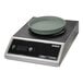 A black and silver Dinex Smart.Therm induction charger with a white plate on top.