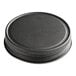 A black metal lid with a metal rim on a round container.