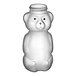 A white bear shaped LDPE honey bottle with a lid.