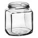 A 9 oz. clear glass oval hex jar with a lid.