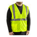 A man wearing a Lavex Lime high visibility safety vest.