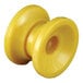 A yellow wheel-shaped insulator with two holes.