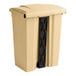 A tan plastic rectangular step-on trash can with black accents.