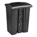 A black plastic Lavex step-on trash can with a lid.