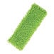 A green microfiber dust mop pad.