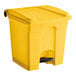 A yellow plastic Lavex rectangular step-on trash can with a black lid and black wheels.