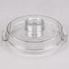 A clear plastic Waring flat bowl cover with a circular hole.