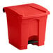 A red plastic Lavex rectangular step-on trash can with a black lid.