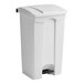 A white Lavex step-on trash can with a black lid.