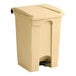 A beige Lavex step-on trash can with a black lid.