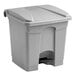 A gray Lavex step-on trash can with a lid.