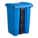 A blue plastic rectangular step-on trash can with a black handle.