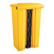 A yellow rectangular Lavex step-on trash can with black handles.