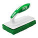 A green and white Libman all-purpose scrubber with a green handle.