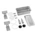 A stainless steel Crathco refrigerated beverage dispenser bowl and drip tray assembly kit over a stainless steel sink with two faucets.