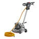 An Advance Pacesetter floor cleaning machine with a yellow cord.