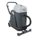 An Advance VL500 wet/dry vacuum machine with a hose attached.