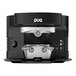 A black and silver PUQpress M5 automatic espresso tamper on a table next to a black and silver coffee machine.
