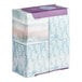 A stack of Puffs Ultra Soft facial tissues in a box.