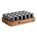 A cardboard box of black Mr. & Mrs. T Bloody Mary Mix cans.